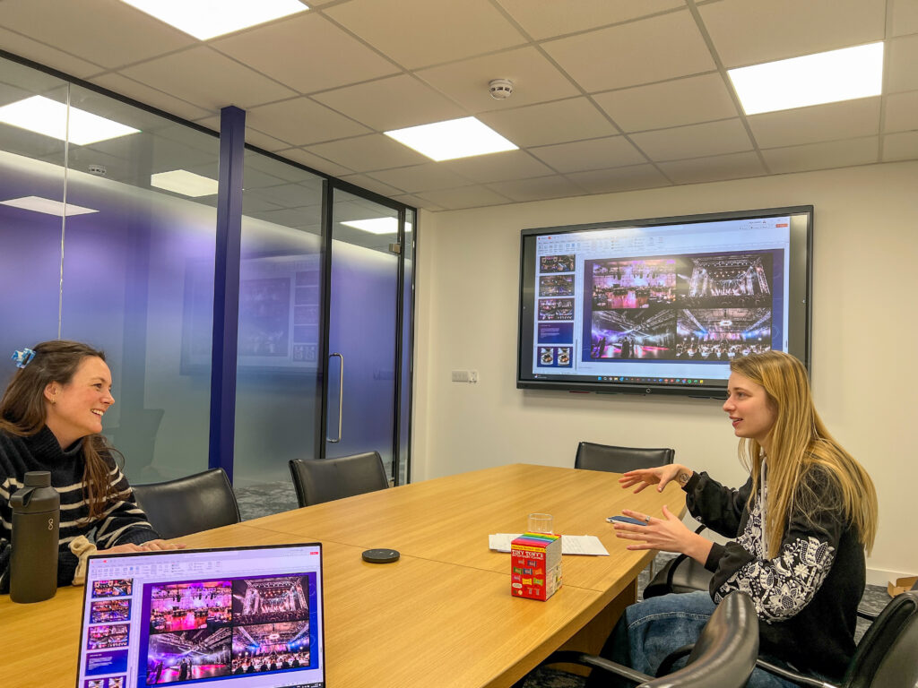 Alina work experience, Alina and Phoebe in meeting room at SLX