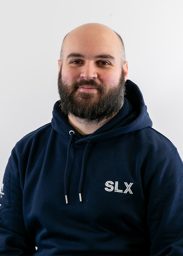 Jack Phillips SLX Deputy Warehouse Manager looking at the camera contently